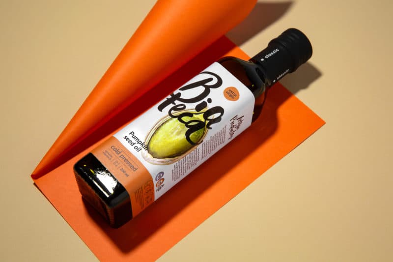 Azamet product bottle on an orange backdrop